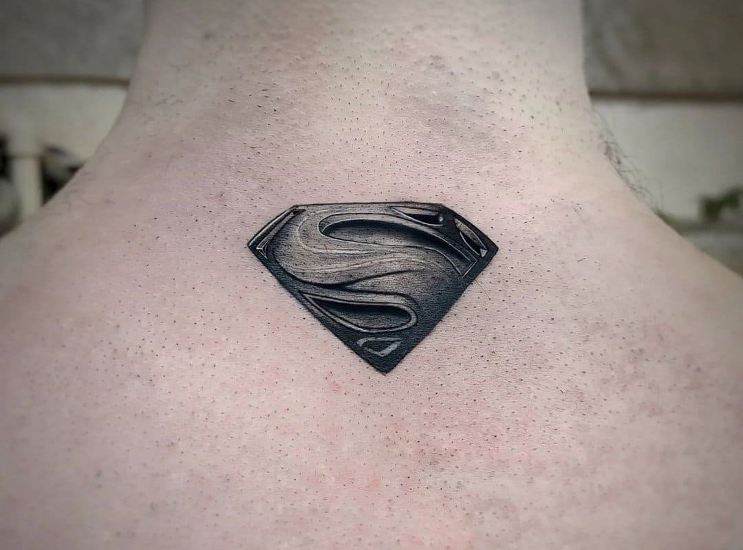 tattoo of the black superman emblem
