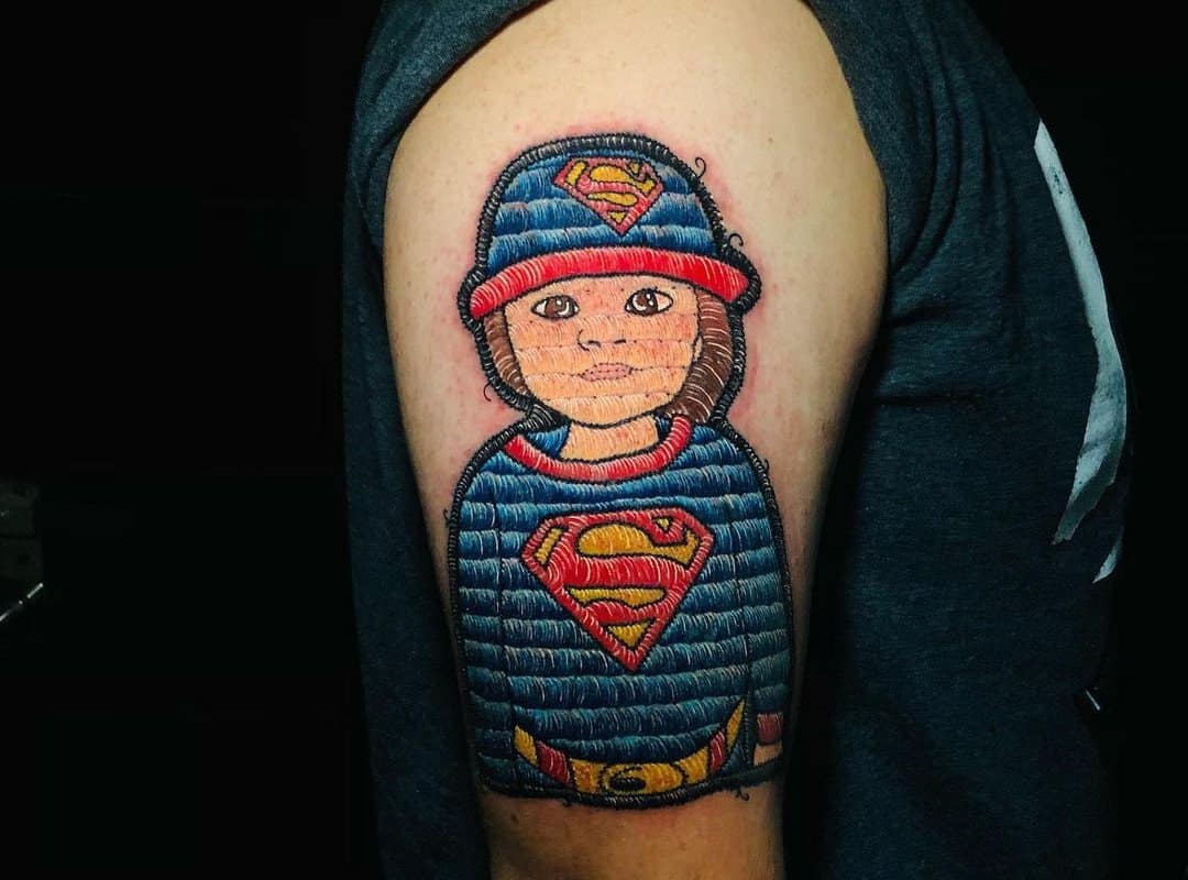 Superman baby tattoo
