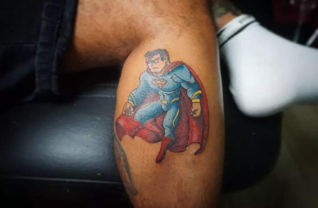 Superman tattoo on the shin