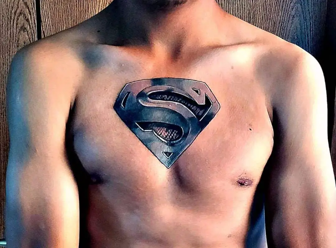 Superman tattoo emblem on the chest