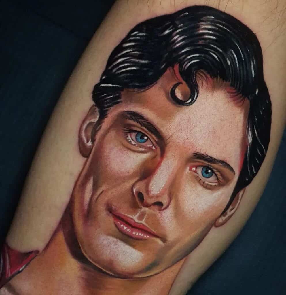 Superman face tattoo