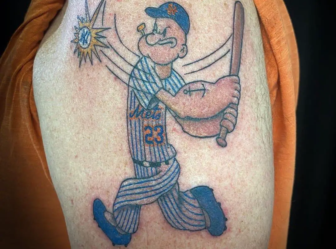 A tattoo of a Popeye sailor playing baseball