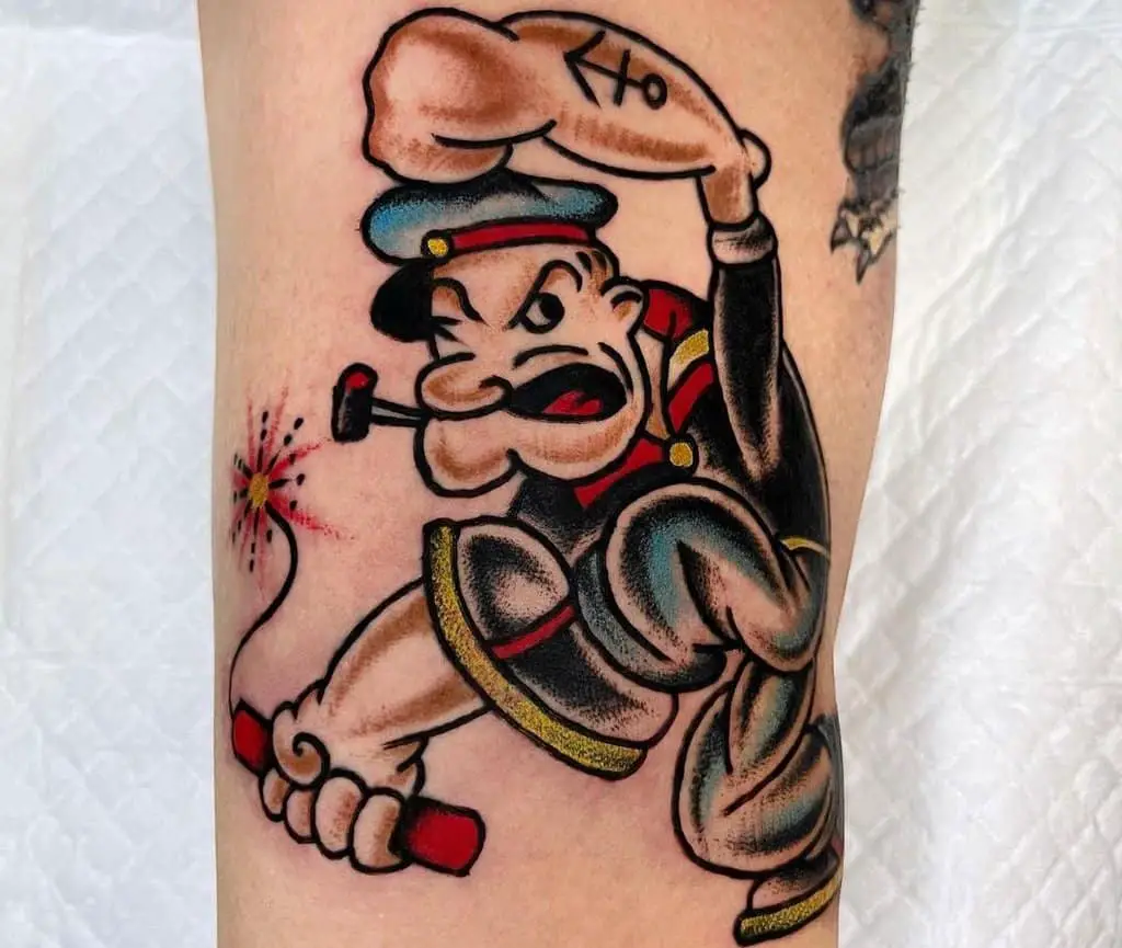 Popeye sailor tattoo with dynamite in his hand