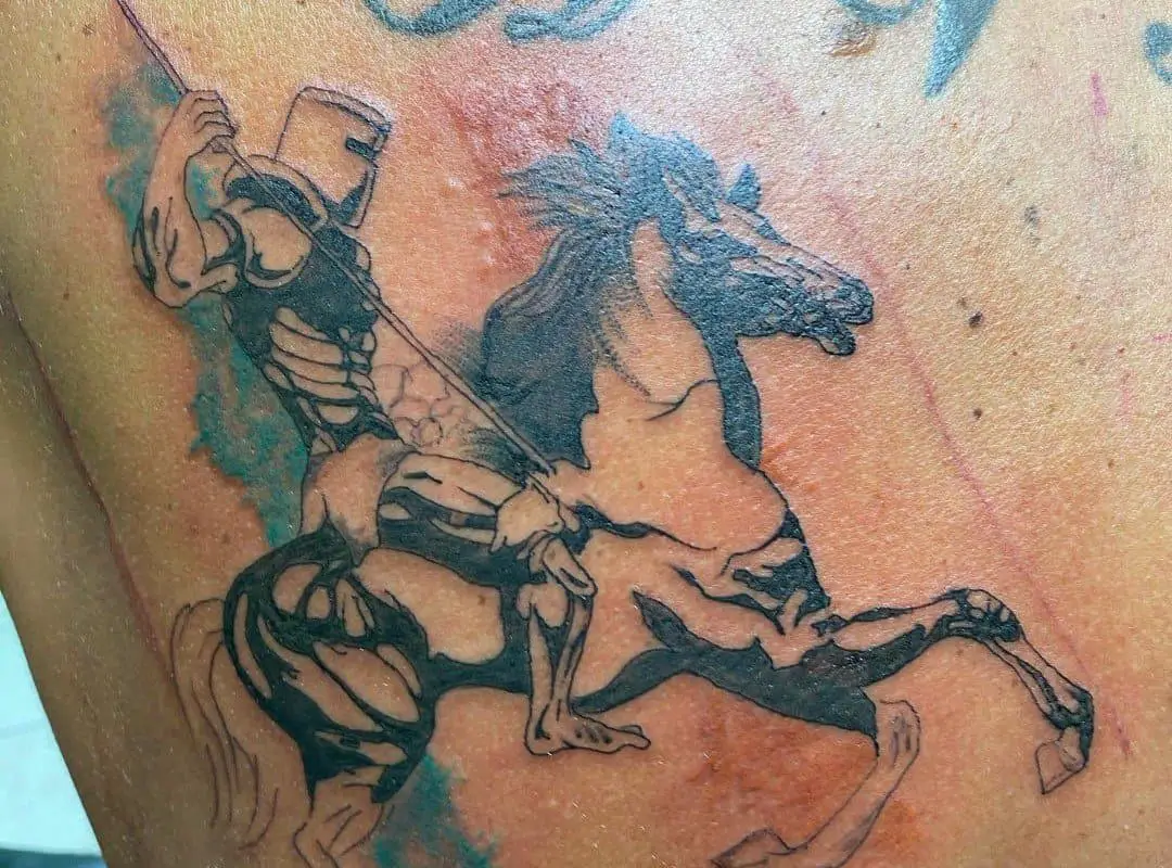 A tattoo of a knight riding a horse