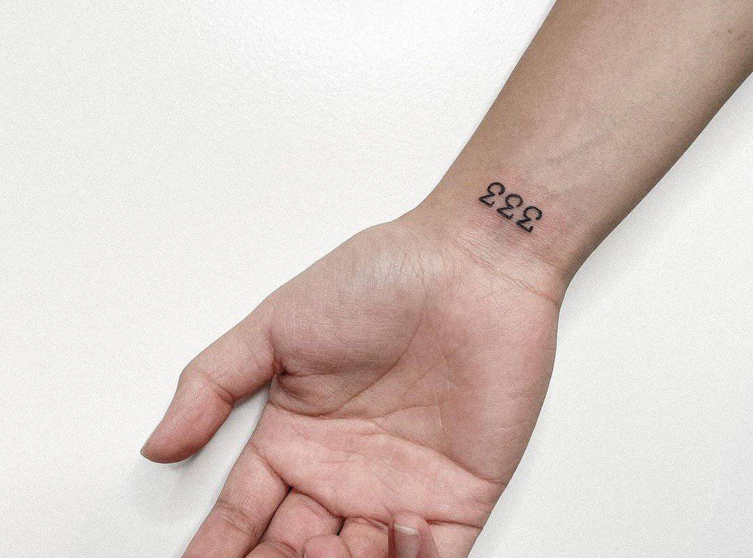 333 tattoo on the wrist
