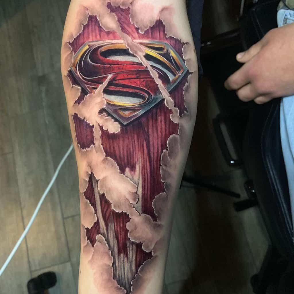 3d muscle tattoo and superman emblem