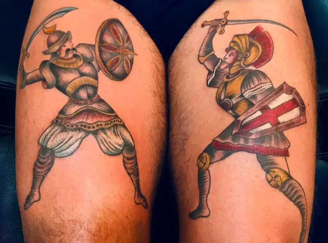 tattoos of two knights on legs