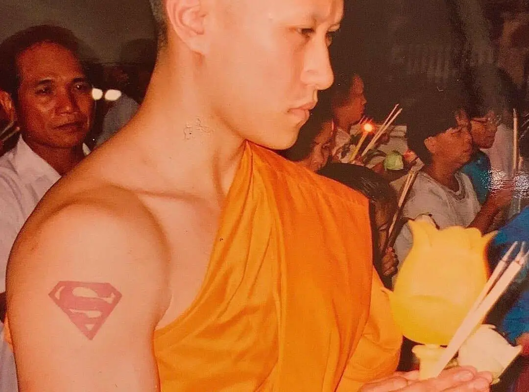 Superman tattoo of a Buddhist monk