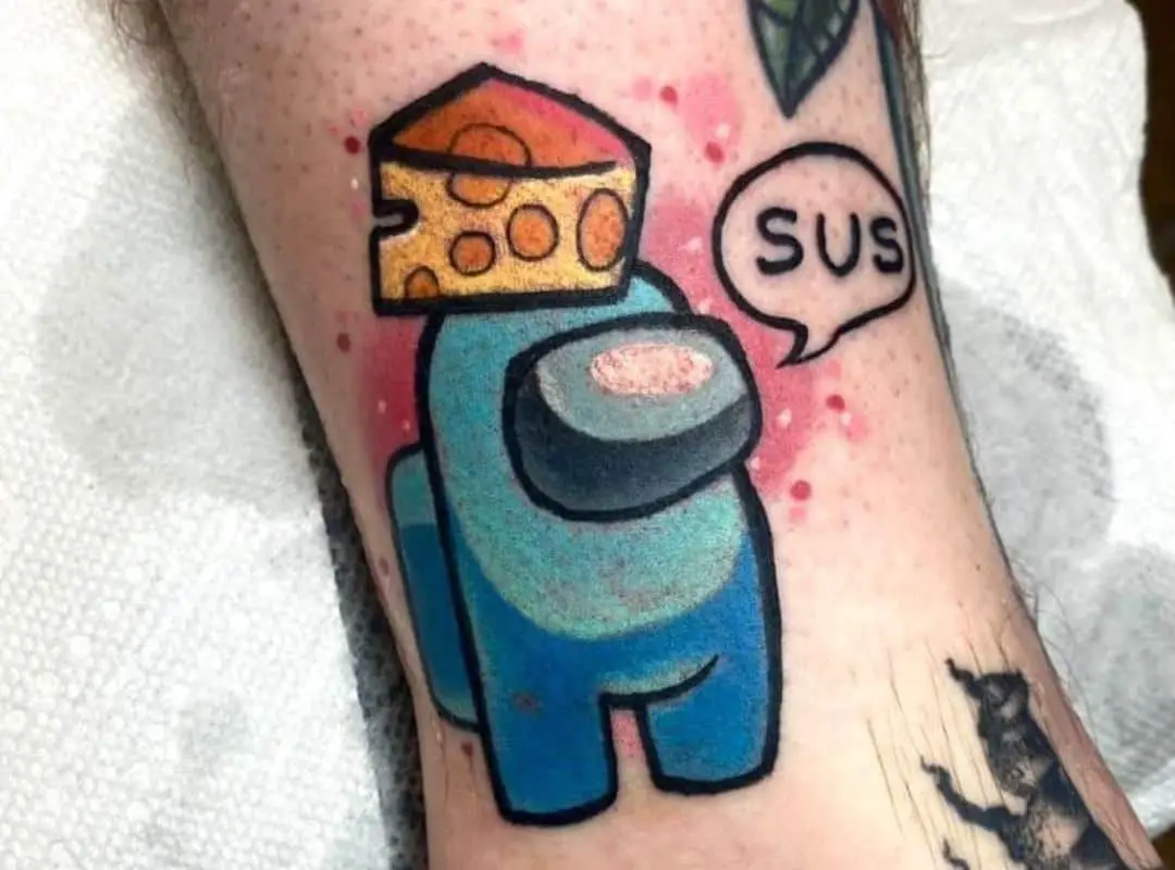 Blue crewmate with cheese on the head tattoo