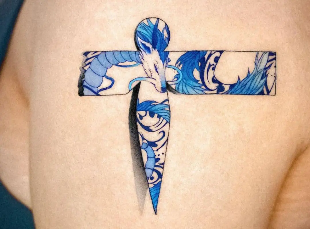 Cross with blue Haku tattoo