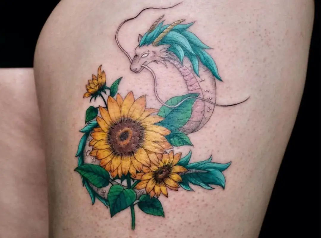 Haku with sunflowers leg tattoo
