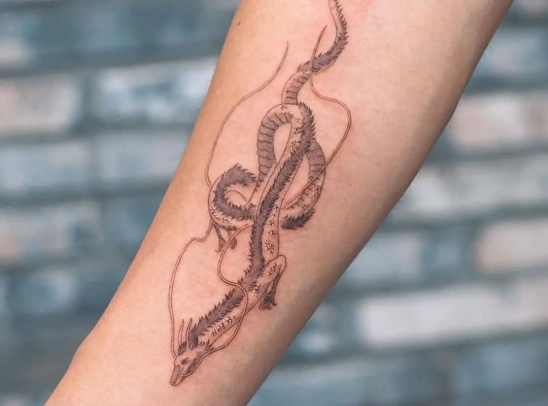 Outline mini Haku arm tattoo