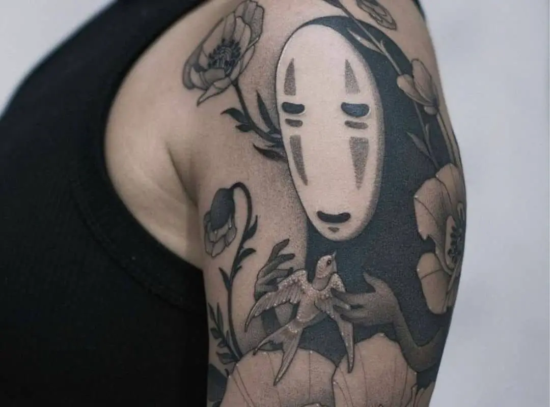 Black and grey No Face sleeve with flowers tattoo