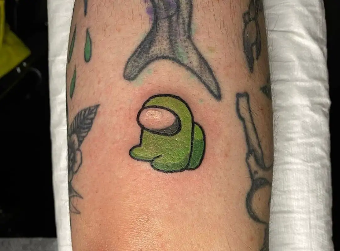 Sitting small green crewmate tattoo