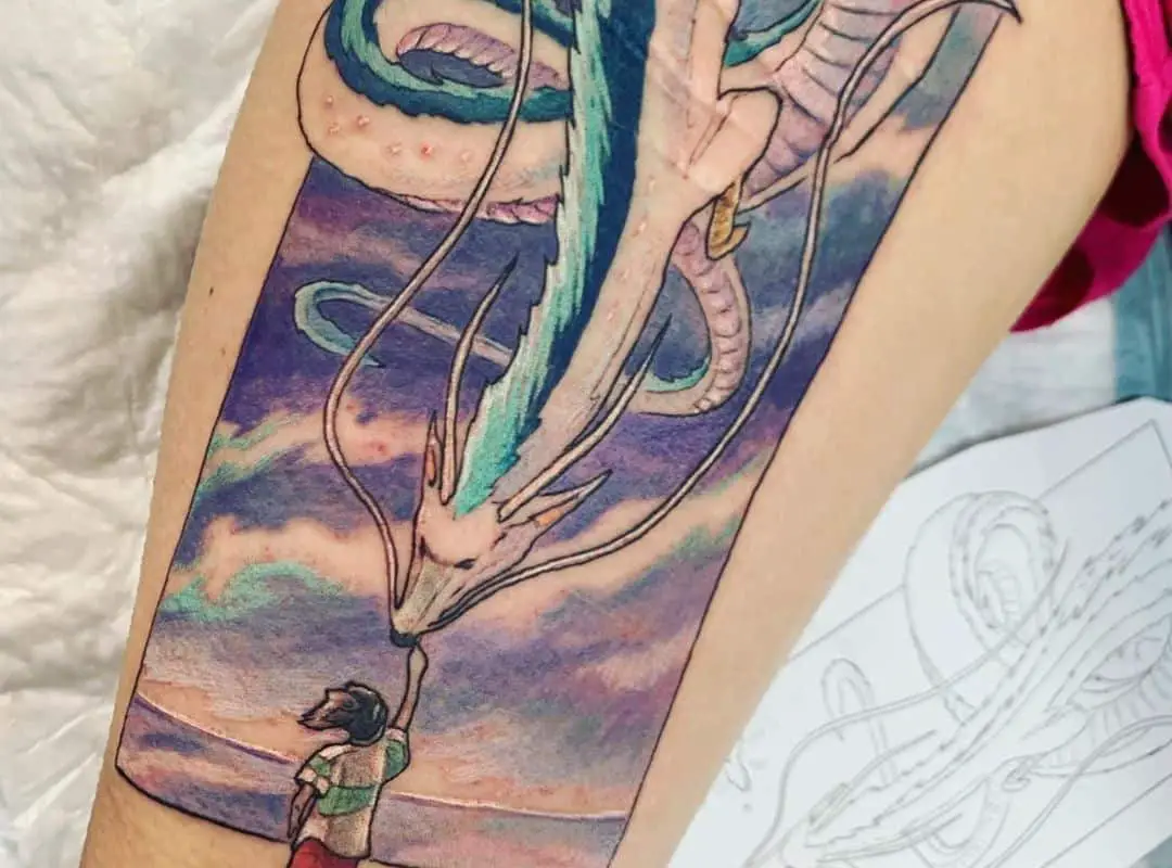 Chihiro touching Haku in the sky tattoo