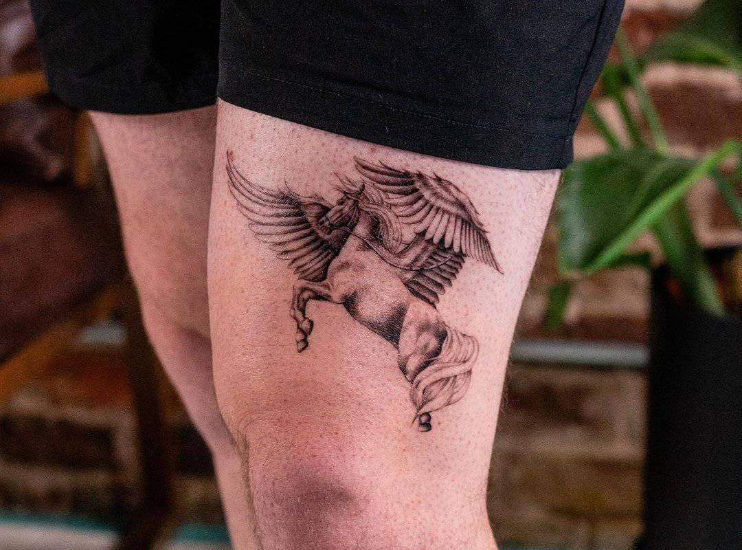 a tattoo of a mighty pegasus