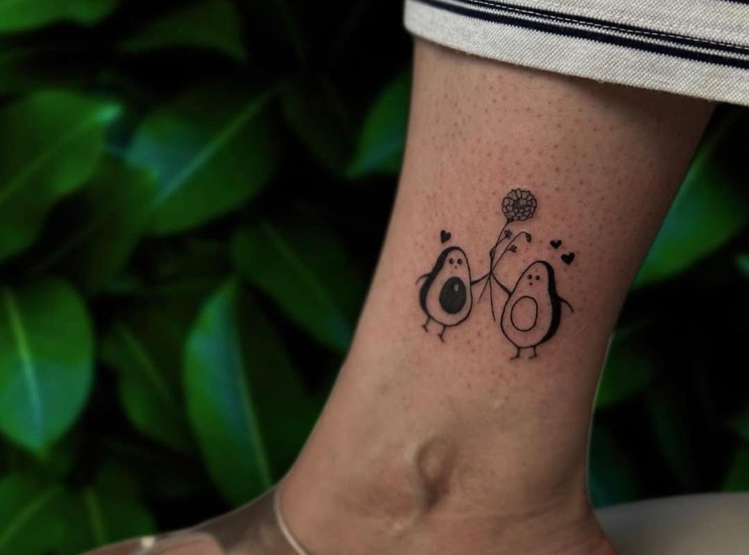 Tattoo of two avocados