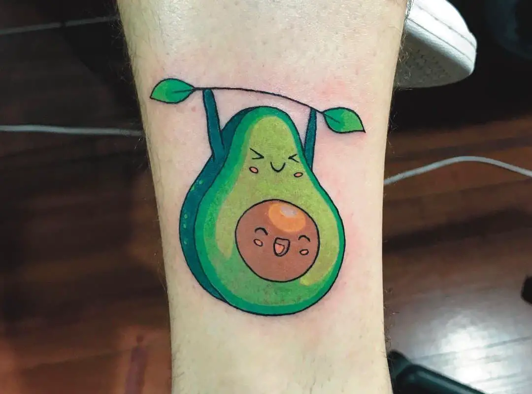 Green athlete avocado tattoo