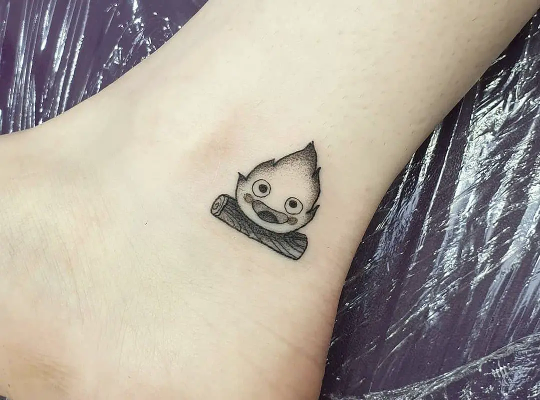 black and white calcifer ankle tattoo