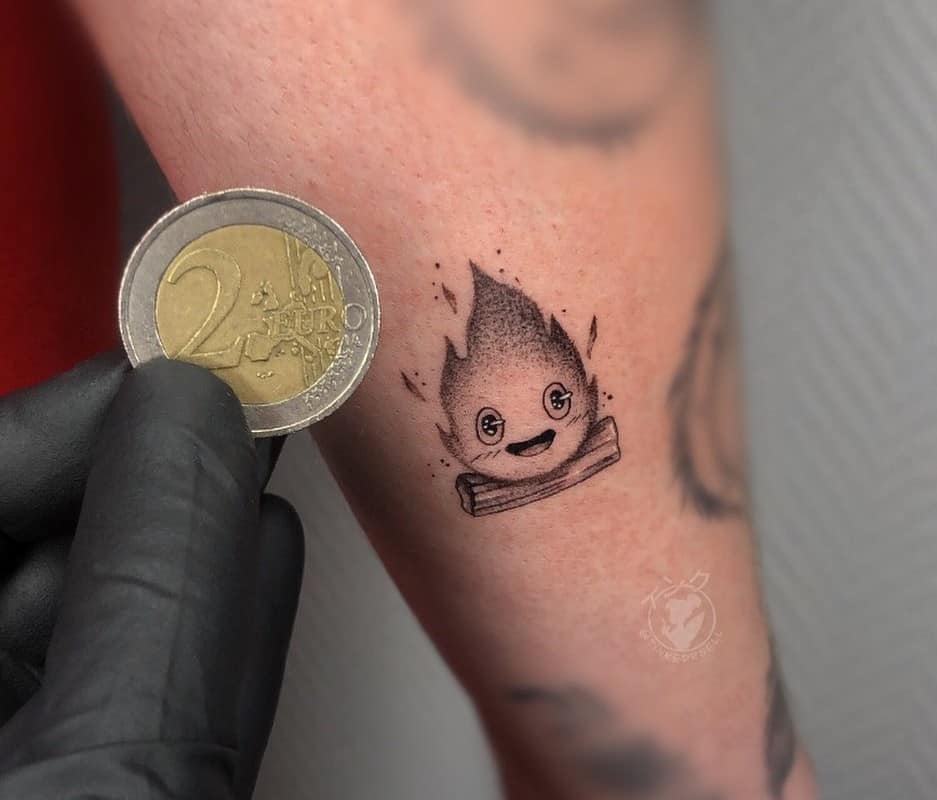 Calcifer tattoo the size of a coin