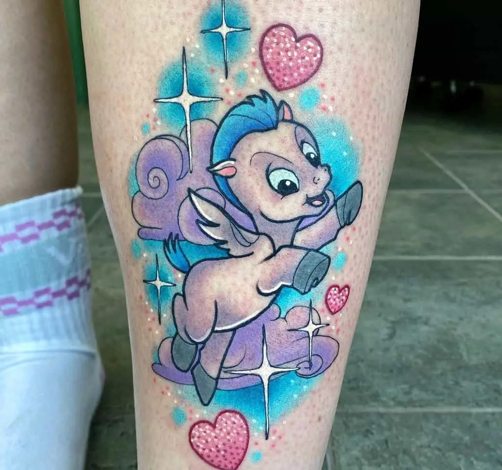 Tattoo of a cartoon pegasus in hearts