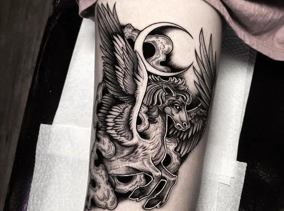 monochrome pegasus tattoo on the leg