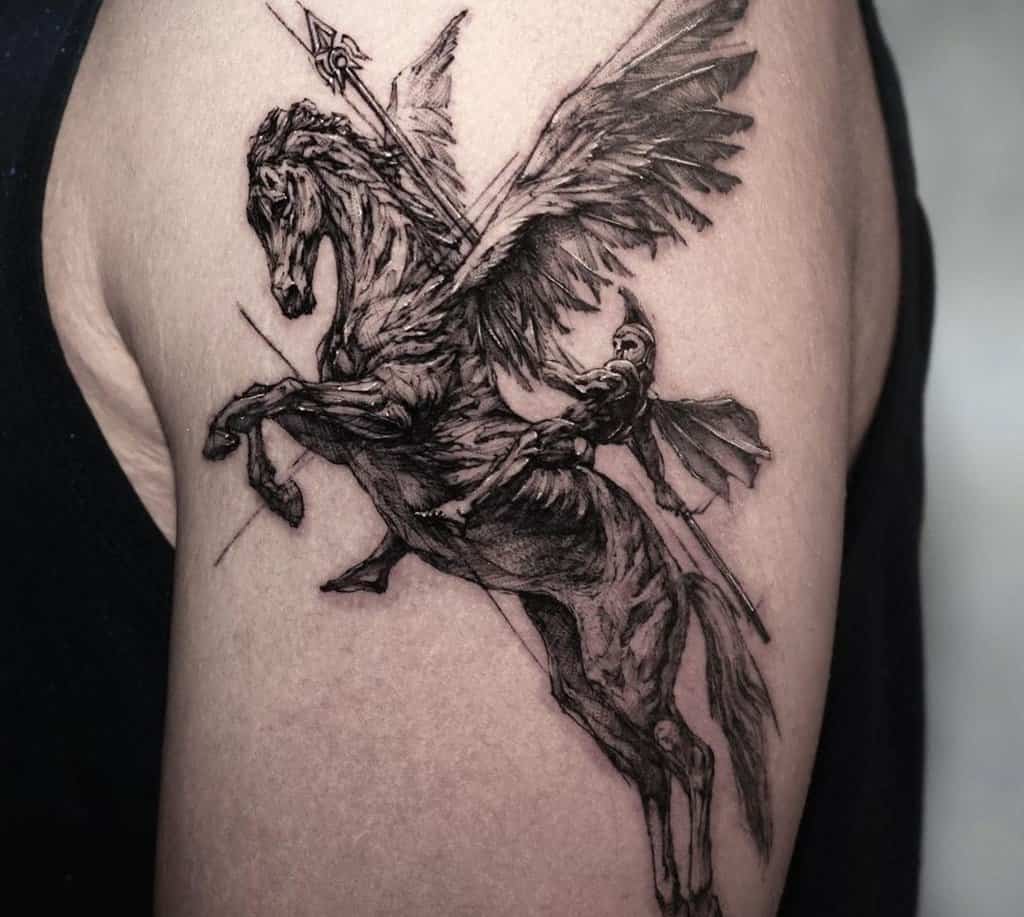 tattoo of a pegasus with a rider on its shoulder