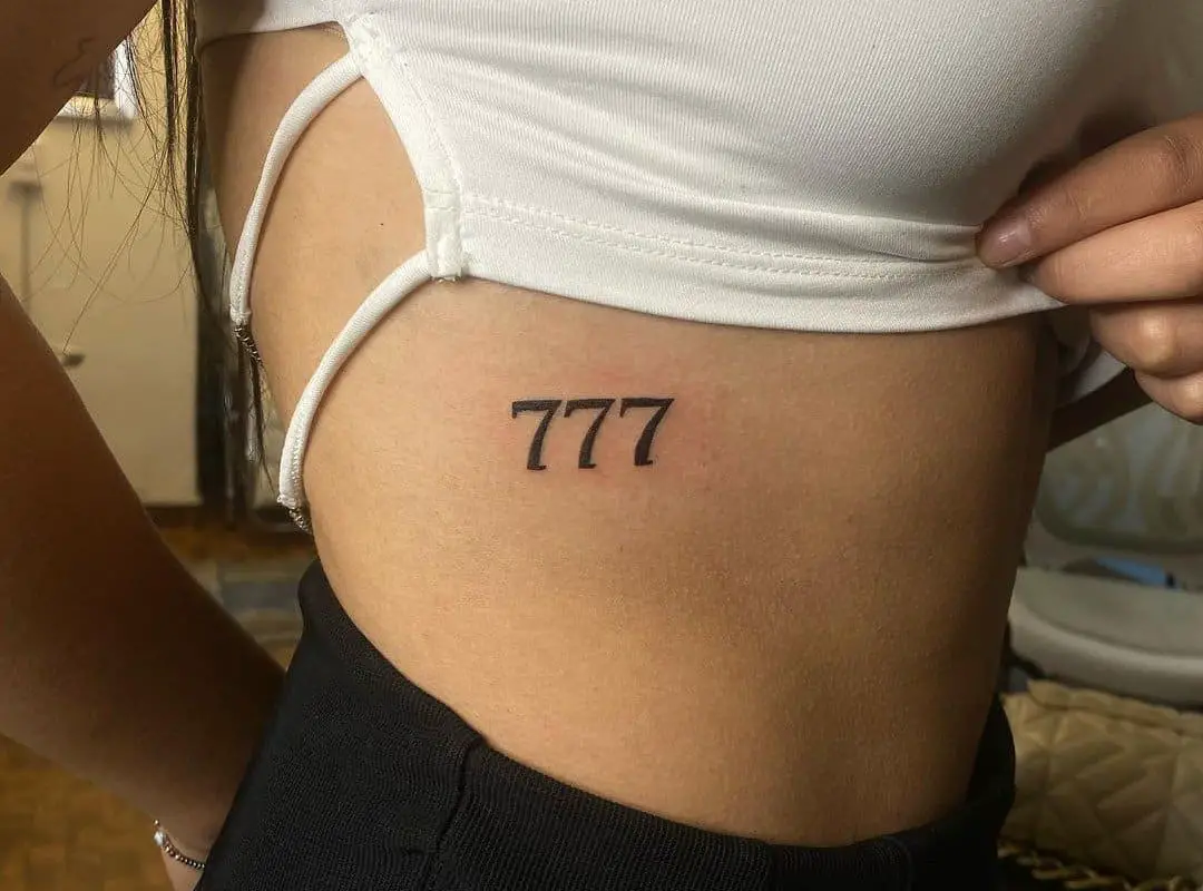 small tattoo 777
