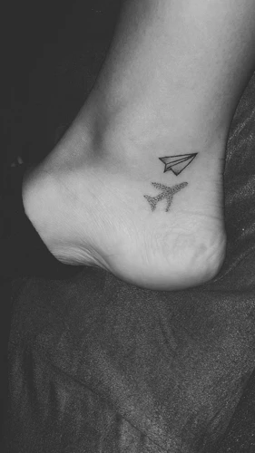 Placement Of Paper Airplane Tattoo
